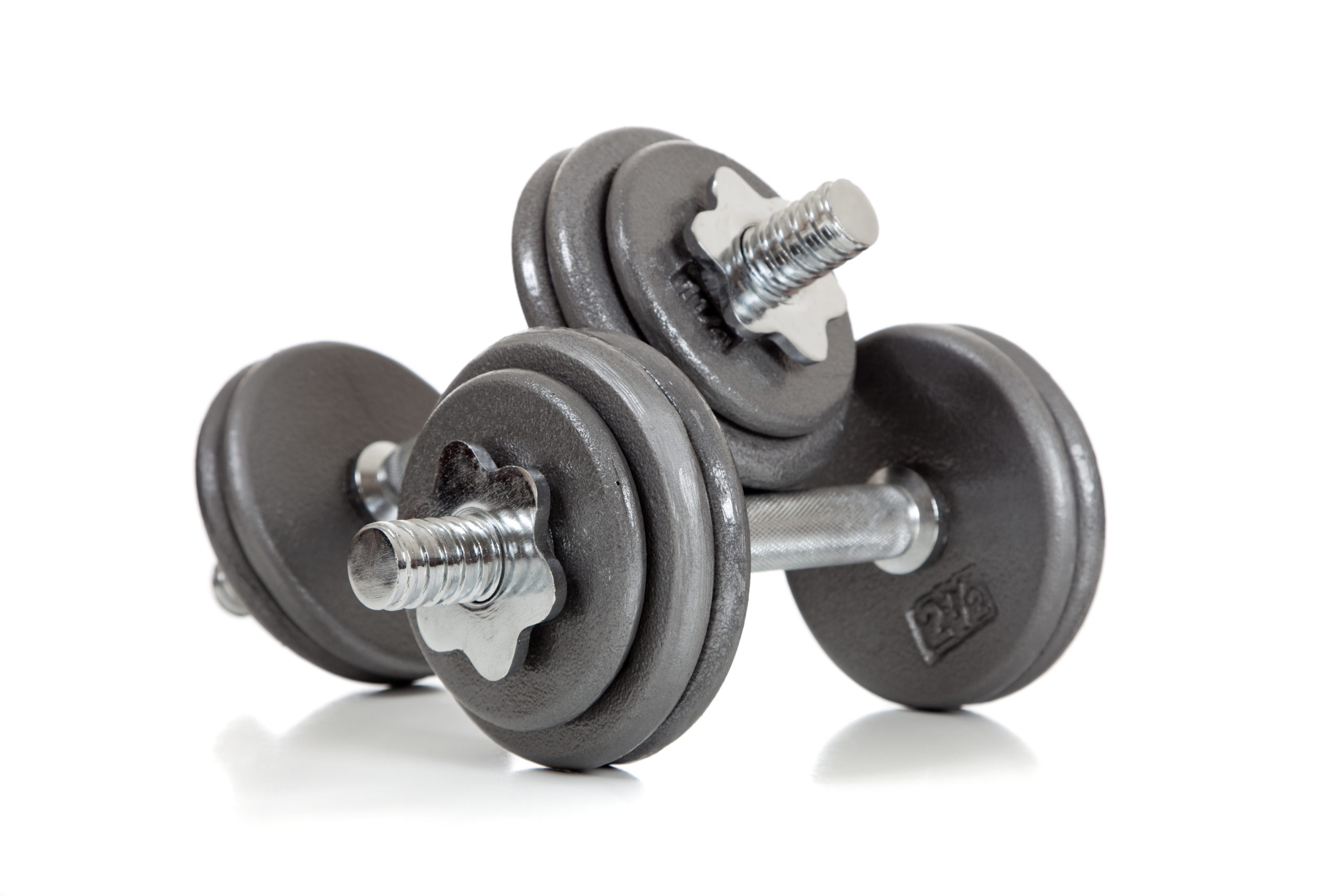 A set of dumbells on a white background